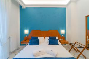 Łóżko lub łóżka w pokoju w obiekcie Hotel San Pietro