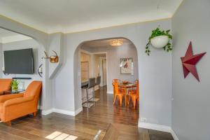 a living room and dining room with a dining table at Pet-Friendly Englewood Escape about 6 Mi to Denver! in Englewood