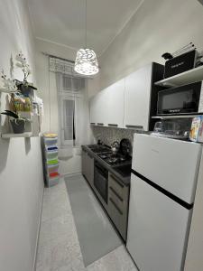 Una cocina o cocineta en CASADOMA Oplonti Pompei