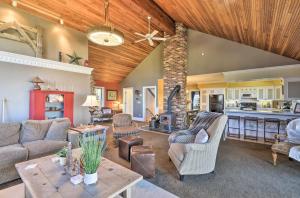a living room with a couch and a table at Hilltop Retreat & Spa in Tully