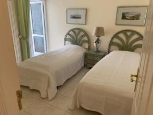 Ένα ή περισσότερα κρεβάτια σε δωμάτιο στο Ocean Pearl, luxuriöses Haus, Meerblick, große Sonnenterrasse, Teneriffa Süd, Los Gigantes, 600m zum Strand, 200m zum Ort, ruhig +34 φωτογραφίες