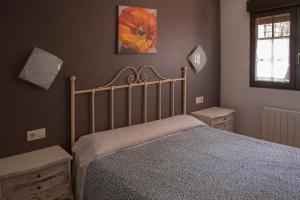 Postel nebo postele na pokoji v ubytování Apartamentos y Habitaciones Casa Bego + 37 fotografií