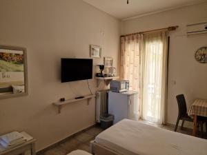 A television and/or entertainment centre at Nontas Home