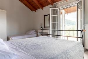 Posteľ alebo postele v izbe v ubytovaní Holiday House Zakynthos + 37 fotografií