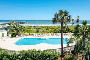 an overhead view of a swimming pool and the beach at Sea Cabin 131 B in Isle of Palms