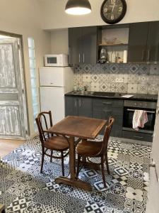 Η κουζίνα ή μικρή κουζίνα στο Appartement centre historique