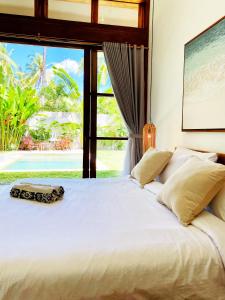 Postel nebo postele na pokoji v ubytování SUNDAY Villa with private pool, near centre and beach