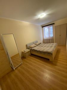 Llit o llits en una habitació de Tsaghkadzor Villa