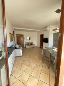 a living room with a couch and a table at appartamento vista mare da MARY in Gallipoli