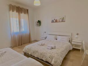 Postel nebo postele na pokoji v ubytování Guest House Service - Express Airport Apartment + 9 fotografií