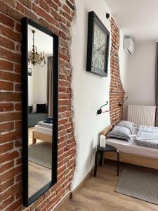 Giường trong phòng chung tại Apartments Galicia