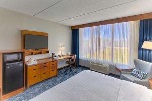 Postel nebo postele na pokoji v ubytování Four Points by Sheraton Raleigh Durham Airport + 19 fotografií