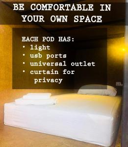 a sign that says be comfortable in your own space at The Black Sheep Hostel in Haad Rin