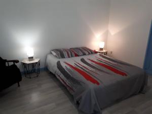 Posteľ alebo postele v izbe v ubytovaní Maison de vacances familiale