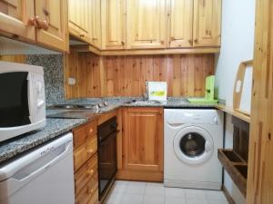 Kuchyň nebo kuchyňský kout v ubytování Apartamento Besiberri 7 planta baja con terraza