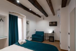 Postel nebo postele na pokoji v ubytování Sofi' Center Rooms