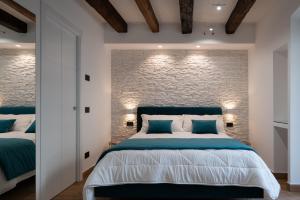 Postel nebo postele na pokoji v ubytování Sofi' Center Rooms