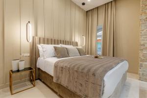 A bed or beds in a room at Domus Victoria IΙ