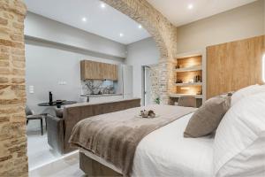 A bed or beds in a room at Domus Victoria IΙ