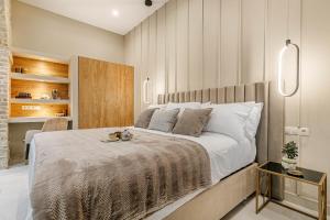 A bed or beds in a room at Domus Victoria IΙ