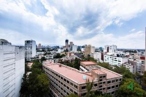 - Vistas al perfil urbano de los edificios en Cozy & Vibrant Loft with Rooftop & Gym in Polanco, en Ciudad de México