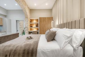 A bed or beds in a room at Domus Victoria IΙ