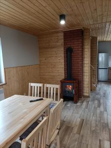 Η κουζίνα ή μικρή κουζίνα στο Zielona Ostoja - domy całoroczne z własną linią brzegową