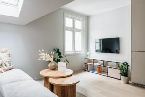 TV a/nebo společenská místnost v ubytování Stay l Fløyen