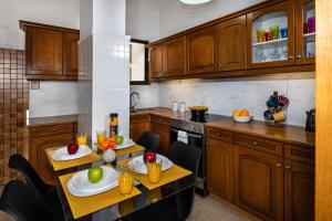 Η κουζίνα ή μικρή κουζίνα στο Central apt. with parking - 3 min from old port