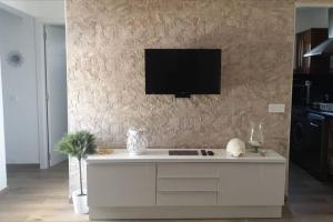 TV a/nebo společenská místnost v ubytování 2 BEDROOM Apartment grandfloor-PTO. DEL CARMEN