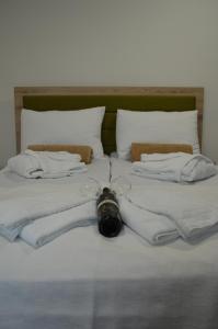 เตียงในห้องที่ Vila Voždov Konak