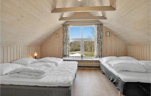 Letto o letti in una camera di 2 Bedroom Gorgeous Apartment In Pandrup