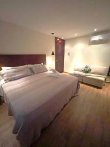 Postel nebo postele na pokoji v ubytování Hotel Diosa del Agua Bacalar