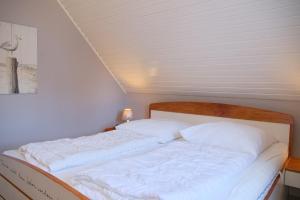 Letto o letti in una camera di Haus Moin Moin