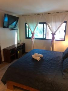 Postel nebo postele na pokoji v ubytování Hotel Diosa del Agua Bacalar