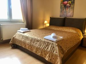 Ένα ή περισσότερα κρεβάτια σε δωμάτιο στο Bright Luxury House