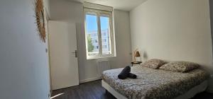 Posteľ alebo postele v izbe v ubytovaní Bel appartement Clairmarais - Centre Reims - Gare