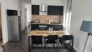 Kuchyňa alebo kuchynka v ubytovaní Bel appartement Clairmarais - Centre Reims - Gare