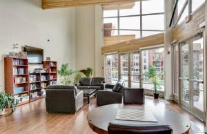 a large living room with a couch and a table at Stay In The Okanagan - Copper Sky, West Kelowna in West Kelowna