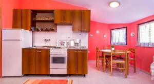 Kuchyň nebo kuchyňský kout v ubytování Apartments Bardak