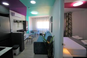 Posteľ alebo postele v izbe v ubytovaní CASATURIS NEWON APARTAMENTOS en EL CAMPELLO