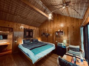 Ein Bett oder Betten in einem Zimmer der Unterkunft H’nee House Ta Van