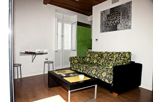 Część wypoczynkowa w obiekcie Apartamentos La Casa de la Alameda