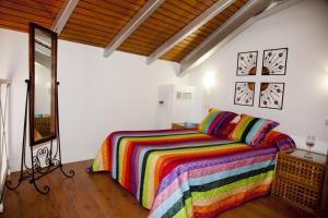 Postel nebo postele na pokoji v ubytování Apartamentos La Casa de la Alameda