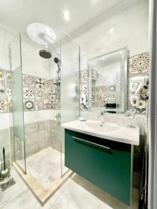a bathroom with a sink and a shower at Studio House 589-1 in 6th Of October