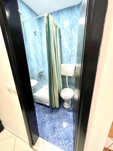 Ένα μπάνιο στο Guest House-MD