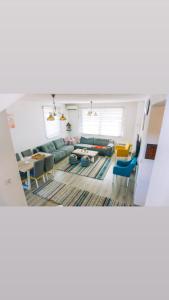a living room with a couch and a table at Dream Villa in Sarajevo