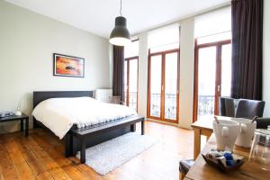 Voodi või voodid majutusasutuse Because the Night city lodge toas