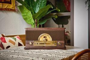 an old radio sitting on top of a table at Hotel POCO Seongsu in Seoul