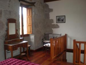 Postel nebo postele na pokoji v ubytování Casa Rural Las Caldereras